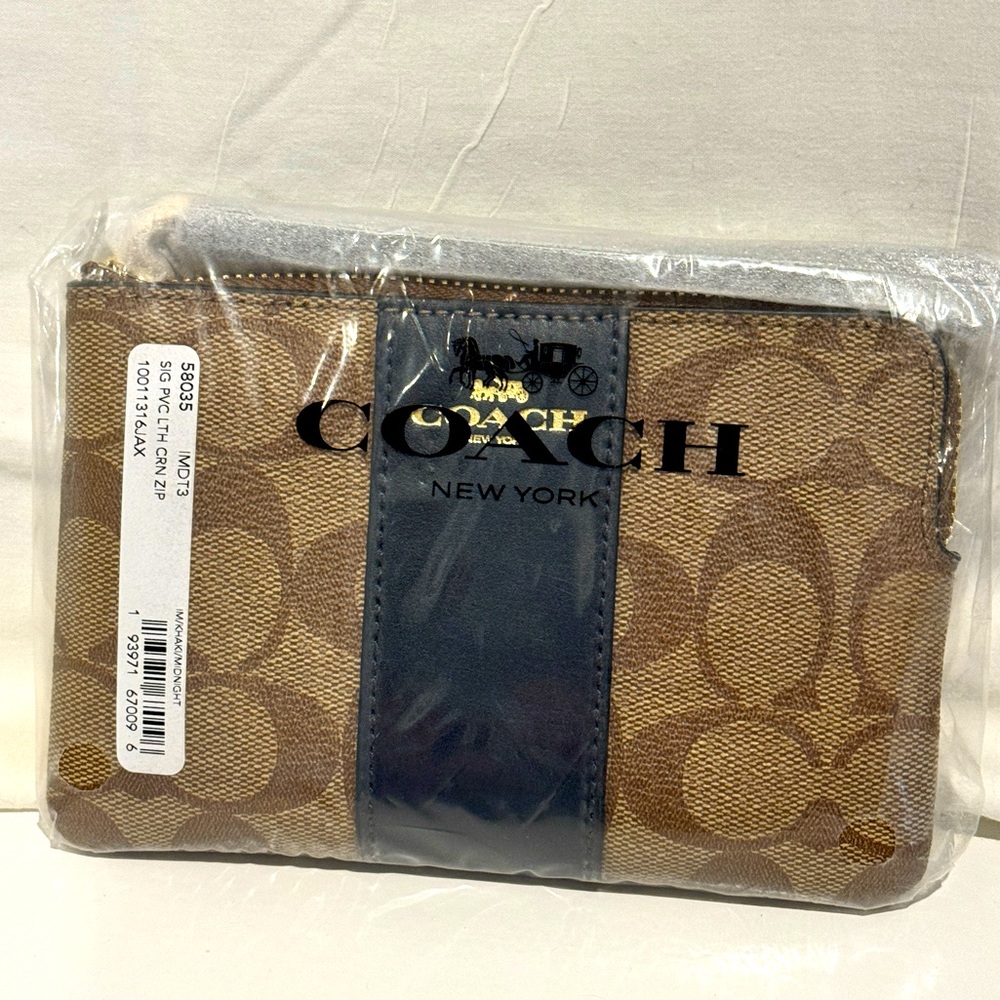 Coach Wristlet unopened!  Signature Canvas with Navy.